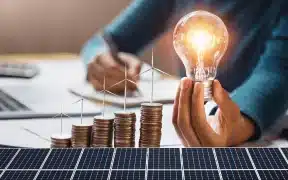 A Man holding a bulb